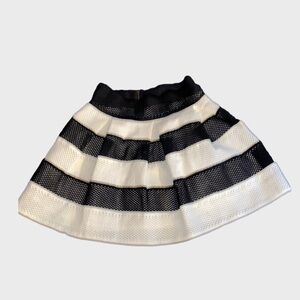Umgee black and white striped skirt with zipper back. Small